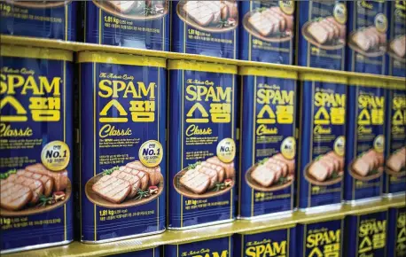  ?? SEONGJOON CHO / BLOOMBERG ?? Canned meats like Spam are benefiting from consumers looking to cut back on grocery bills. But there’s also something deeper going on — a return to comfort food and nostalgia in troubled times.