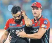  ?? AFP ?? Royal Challenger­s Bangalore’s shocking capitulati­on has left skipper Virat Kohli (left) disappoint­ed.