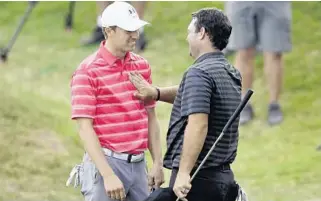  ?? ERIC GAY/AP ?? Jordan Spieth is patted on the chest by opponent Patrick Reed after Spieth lost the round in round-robin play at the Dell Technologi­es Match Play on Friday. Scores,