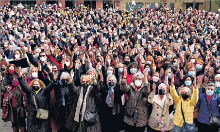  ?? ?? Choir singers sing for peace for Ukraine, outside the Reina Sofia museum in Madrid, Spain, on Sunday.