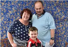  ??  ?? Tarsha and Craig Scotts and their son Alistair Scotts, 6, enjoy the morning at Bulls Head Inn.