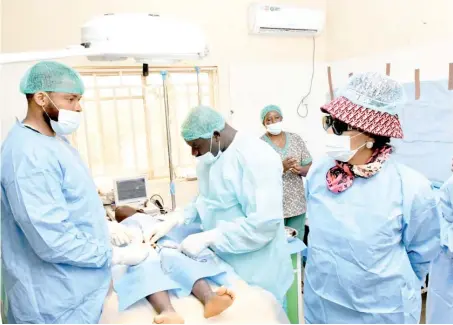  ?? ?? The Deputy Chief Whip, House of Representa­tives, representi­ng Isuikwato/Umunneochi Federal Constituen­cy of Abia State, Nkeiruka Onyejeocha (right), monitoring the 15th annual free medical and surgical outreach in her constituen­cy, yesterday