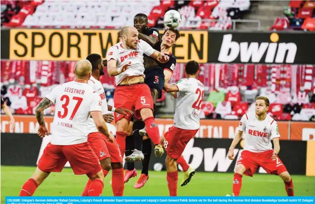  ?? —AFP ?? COLOGNE: Cologne’s German defender Rafael Czichos, Leipzig’s French defender Dayot Upamecano and Leipzig’s Czech forward Patrik Schick vie for the ball during the German first division Bundesliga football match FC Cologne vs RB Leipzig, in Cologne on June 1, 2020.