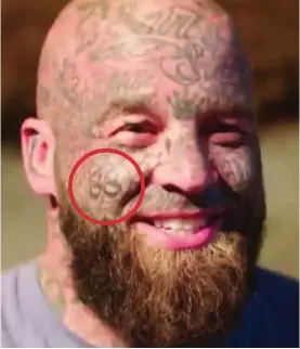  ??  ?? Ink : Darren Lumsden with the alleged Nazi 88 tattoo, circled