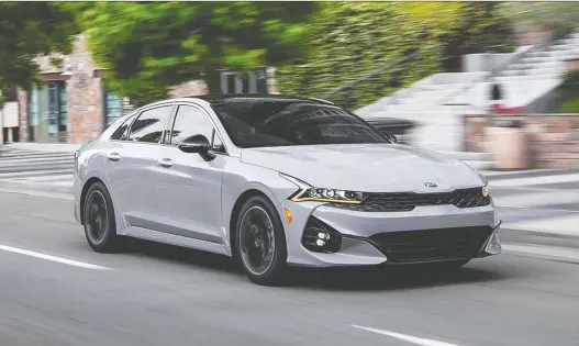  ?? PHOTOS: KIA ?? The 2021 Kia K5 exterior style adopts a Stinger-like profile, but without the liftback. This means that you get a fastback four-door sedan, coupled with a sleek coupe-like profile.