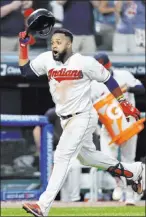  ?? Tony Dejak The Associated Press ?? Indians first baseman Carlos Santana celebrates after hitting a walk-off home run in the ninth inning for a 6-5 win against the Boston Red Sox on Monday in Cleveland.