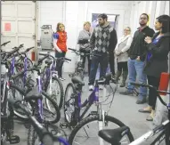  ?? BEA AHBECK/NEWS-SENTINEL ?? The Lodi Satellite Rotary delivers 100 bikes to Lodi Adopt-aChild in Lodi on Tuesday.