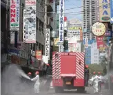  ?? Reuters ?? Firefighte­rs spray disinfecta­nts along a street in Colombo as the Sri Lankan government expects to reopen the country after almost two months locked down.