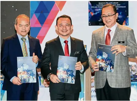  ??  ?? (From left) Education secretary-general Datuk Dr Mohd Gazali Abas, Dr Maszlee and Dr Amin at the launch of the 2017 annual report on the Malaysia Education Blueprint 2013-2025.