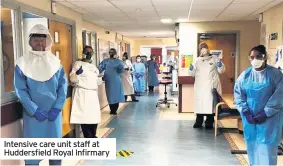  ??  ?? Intensive care unit staff at Huddersfie­ld Royal Infirmary