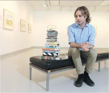  ?? MICHELLE BERG ?? Shaun Mason, one of the organizers of Music in the Gallery, sits in the second floor gallery at the Frances Morrison Library where a monthly music series will be held starting May 23. The first show features ambient musician Ursa. The program, which...