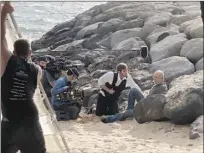  ?? Photos courtesy of Maui Film Office ?? Bruce Willis (right) and Blake Jenner in “Paradise City” during filming at the Kihei Boat Ramp in May.