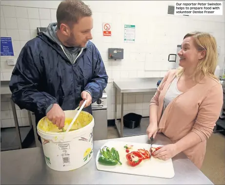  ??  ?? Our reporter Peter Swindon helps to prepare food with volunteer Denise Fraser