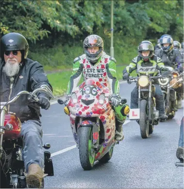  ??  ?? TRIBUTE Hundreds of motorcycli­sts joined the funeral procession yesterday for Louise Smith