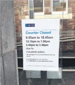  ?? PHOTO: ROB KIDD ?? Operations disrupted . . . A sign at the entrance to the Dunedin District Court yesterday.