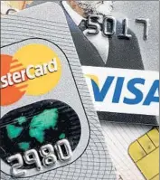  ?? Martin Meissner
Associated Press ?? USING CREDIT CARDS is often helpful in travel, but be careful about using them for cash advances.