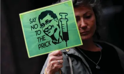  ?? Photograph: James Veysey/REX/Shuttersto­ck ?? An anti-vaccine protester outside the Bill and Melinda Gates Foundation HQ in central London.