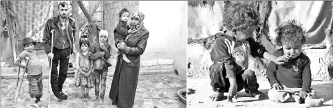  ??  ?? (Left) A Syrian father who suffers from severe legs injuries following shelling in the rebel held areas around Damascus, is surrounded by his children, one of them had lost a leg, at their house in the Eastern Ghouta town of Hamouria. • (Right)...