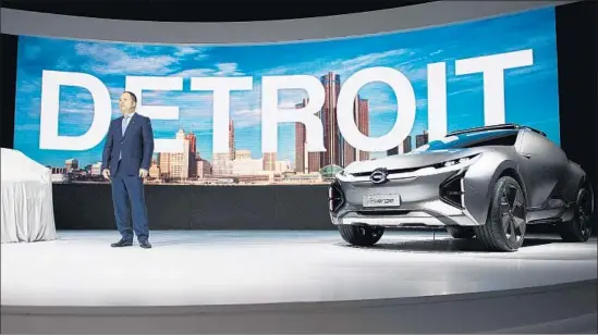  ?? Jim Watson AFP/Getty Images ?? CHINESE automaker GAC Motor plans to start selling an SUV in the U.S. next year. Above, GAC President Yu Jun speaks at the Detroit auto show last month.