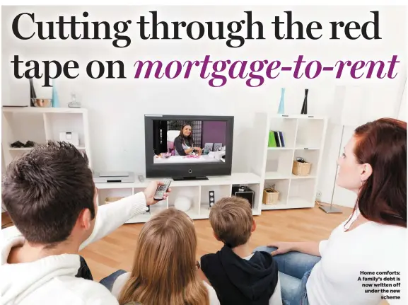  ??  ?? Home comforts: A family’s debt is now written off under the new scheme