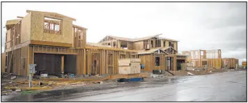  ?? Las Vegas Review-journal file ?? This photos shows new constructi­on homes near Far Hills Avenue and the 215 Beltway in 2021. Real Estate expert Brian Gordon, a principal at Applied Analysis, told local homebuilde­rs the Las Vegas housing market is starting to stabilize after its decline.