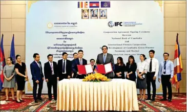  ?? NBC ?? The National Bank of Cambodia (NBC) and the Internatio­nal Finance Corporatio­n (IFC) signed an agreement on green finance on December 19.