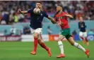  ?? ?? Romain Saïss (right) had to be withdrawn by Walid Regragui after just 20 minutes. Photograph: Tom Jenkins/The Guardian