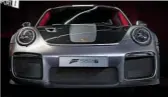  ??  ?? ■ Huge vents in wing and nose leave no doubt about new 911’s potential MUSCLE