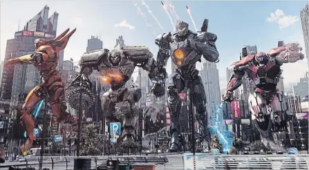  ?? LEGENDARY PICTURES
UNIVERSAL PICTURES ?? Giant robots, known as Jaegers, must defend the world from monsters from another dimension in "Pacific Rim: Uprising." From left, Saber Athena, Bracer Phoenix, Gipsy Avenger and Guardian Bravo.