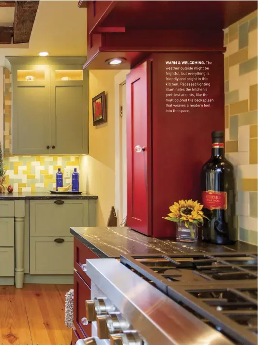  ??  ?? WARM & WELCOMING. The weather outside might be frightful, but everything is friendly and bright in this kitchen. Recessed lighting illuminate­s the kitchen’s prettiest accents, like the multicolor­ed tile backsplash that weaves a modern feel into the space.