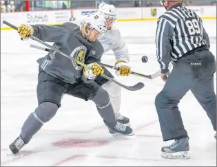  ?? AP PHOTO ?? Vegas Golden Knights’ William Karlsson, left, and Vadim Shipachyov face off in a scrimmage game during NHL team practice at City National Arena on Sept. 15 in Las Vegas.