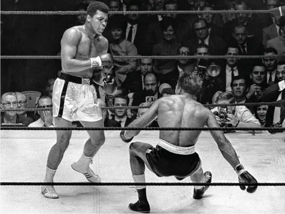  ?? Staff file photo ?? “He had a reputation for hitting hard, he just couldn’t find anything to hit,” Muhammad Ali would say after beating Cleveland Williams at the Astrodome in 1966.