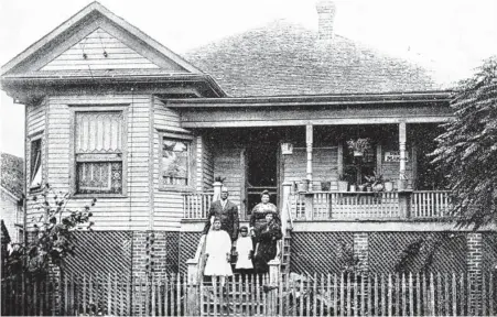  ?? Houston Metropolit­an Research Center | Houston Public Library ?? Annie Hagen, shown with family members on the steps of her 1908 home on Hobson, was a much-respected nurse and midwife.