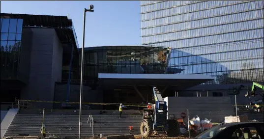  ?? MARVIN JOSEPH/WASHINGTON POST ?? Exteriors of the new MGM National Harbor were still under constructi­on in Oxon Hill, Md., on Oct. 18. The casino has met and exceeded goals of contractin­g minority-owned businesses in Prince George’s County, Md.