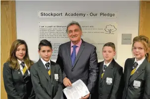  ??  ?? Principal Frank McCarron with, from left, academy students Abbey-Kaye Davies, Timothee Teixeira, Charlie Wilson and Macey Orchard-Shone