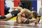  ?? ROD JAMES - FOR DIGITAL FIRST MEDIA ?? Exeter’s Austin DeSanto, top, defeated four-time Calif. state champion Justin Mejia at the Pittsburgh Wrestling Classic last weekend.