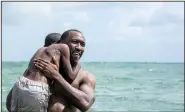  ?? Democrat-Gazette file photo ?? Alex Hibbert (left) and Mahershala Ali star in Moonlight, which was (eventually) named best picture at the 2017 Academy Awards.