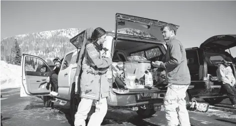  ?? KATE RUSSELL/THE NEW YORK TIMES ?? Visitors make meals in November at Wolf Creek Ski Area in Pagosa Springs, Colorado.