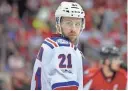  ?? NICK WASS/AP ?? The Coyotes acquired center Derek Stepan (21) and goalie Antti Raanta from the Rangers for defenseman Anthony DeAngelo and the seventh overall pick on Friday.