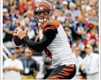  ?? WINSLOW TOWNSON / AP ?? Andy Dalton (above) is entering his seventh year as Cincinnati’s starting quarterbac­k. The Bengals have former Alabama standout AJ McCarron as his backup for at least one more season.