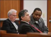  ?? ERIC BONZAR — THE MORNING JOURNAL ?? Marlon J. Johnson, 42, of Lorain, appears alongside attorneys Kenneth N. Ortner, left, and Michael J. Camera in Lorain County Court of Common Pleas Judge James L. Miraldi’s courtroom for closing arguments April 19. Johnson is on trial for the Jan. 1...