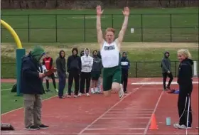 ?? KEV HUNTER/MEDIANEWS GROUP ?? Pennridge’s Marshall Fowler competes in the long jump.