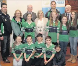  ??  ?? Best Sports winners Bray Emmets (L-R) Eleanor Carroll Hayes, Jane Butler, Philip Hannigan, Cllr Tracy O'Brien, Bray Town Council; Gary Prunty, Amy Butler, Shauna Ryan, Rory Benville, President Bray Chamber. Front: Laura Butler, Nathan Prunty, Adam...