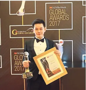  ??  ?? Lee with his McMillan Rising Stars Awards: Most Promising Violinist of the Year 2017 at the McMillan Woods Global Awards 2017.