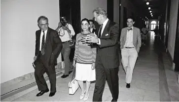  ?? JOSE LOPEZ The New York Times ?? Ruth Bader Ginsburg, then a nominee to the Supreme Court, meets with then-Sen. Joe Biden, chairman of the Senate Judiciary Committee, on Capitol Hill in Washington on July 16, 1993.