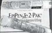  ?? Lucas Trieb AFP/Getty Images ?? THE PRICE for a pair of EpiPens has risen more than 500% since Mylan acquired the product in 2007.