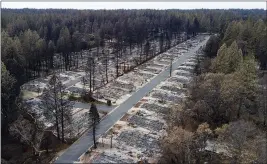  ?? NOAH BERGER — THE ASSOCIATED PRESS FILE ?? Homes leveled by the Camp Fire line the Ridgewood Mobile Home Park retirement community in Paradise.