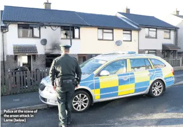  ??  ?? Police at the scene of the arson attack in Larne (below)