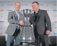  ?? JONATHAN HAYWARD/THE CANADIAN PRESS VIA AP ?? Ottawa Redblacks head coach Rick Campbell, left, shakes hands with Edmonton Eskimos head coach Chris Jones in Winnipeg, Manitoba, in 2015.