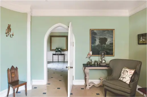  ??  ?? ENTRANCE HALL
“I chose the colour in the entrance hall (below) to give it the feel of another living space,” says interior designer Nina Campbell. The painting was moved from the main house into this scheme as it matches the walls perfectly.
Walls in...